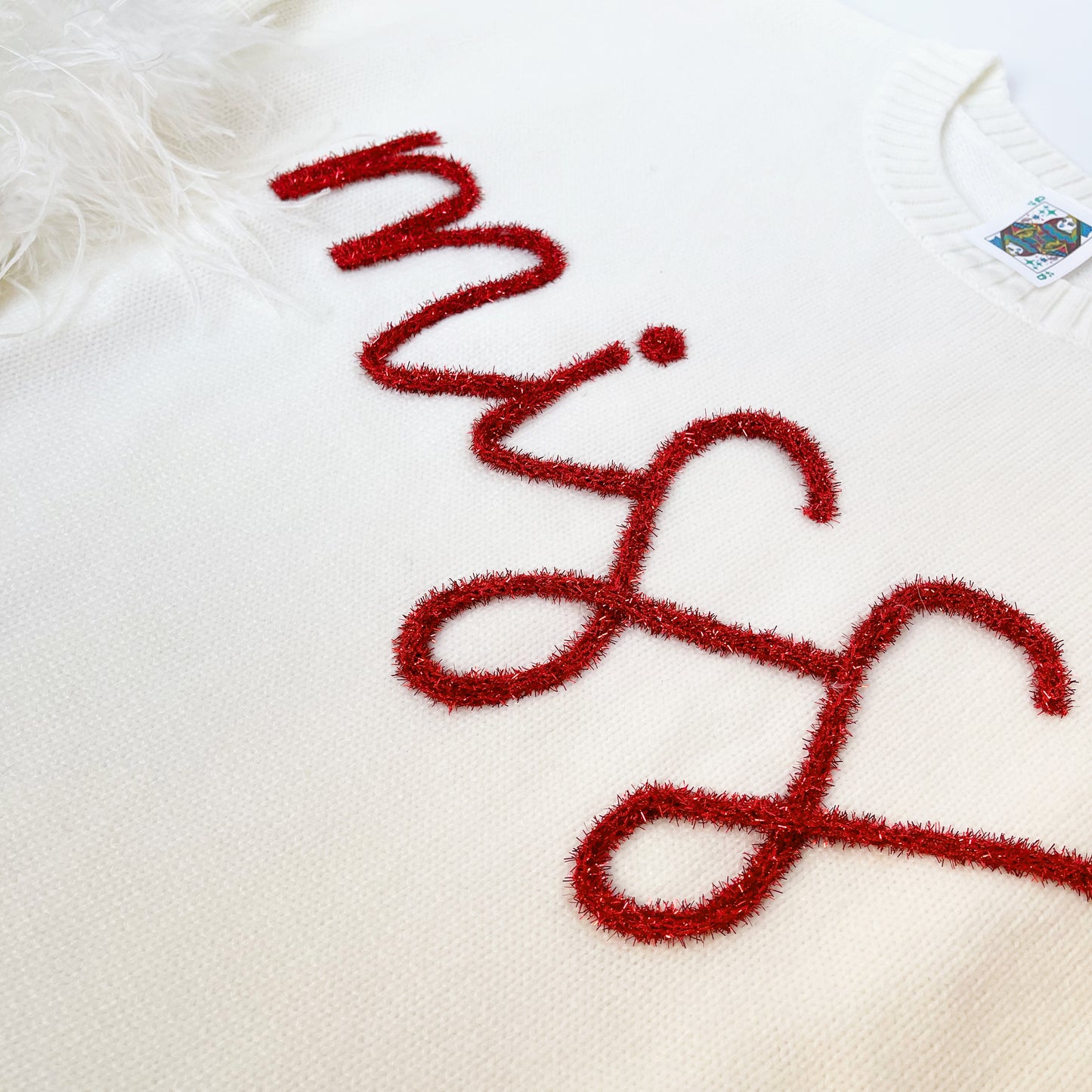 Miss Feather Sleeve Sweater
